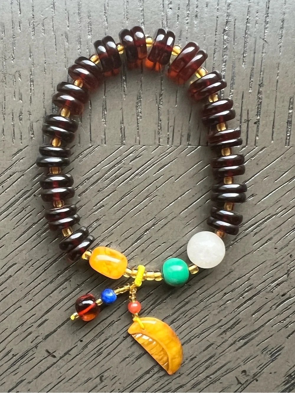 Blood Amber donut bracelet with charm 9mm SIZE 6.5’